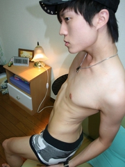cute Korean boy playing with his sex toy while jerking off