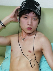 cute Korean boy playing with his sex toy while jerking off
