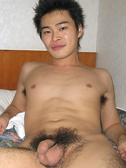 Hot Japanese guy with a nice body shows off his big cock