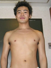 Hot Japanese guy with a nice body shows off his big cock