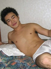 Hot Japanese guy with a nice body shows off his big cock