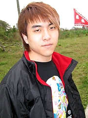 Cute Japanese guy gets naked on the beach